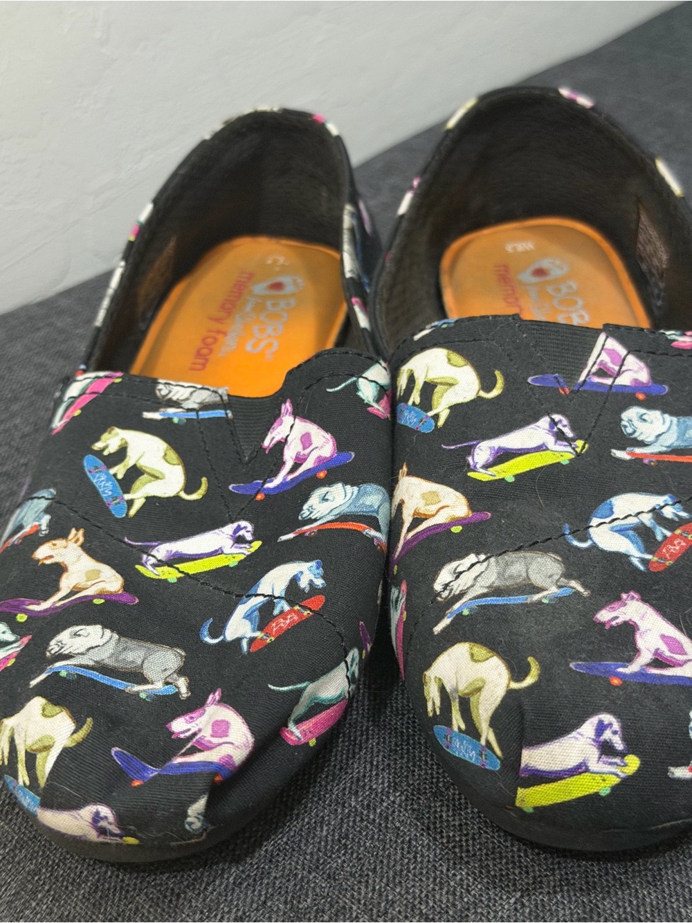 BOBS from Skechers Black Slip-On Flats with Colorful Skateboarding Dog Print